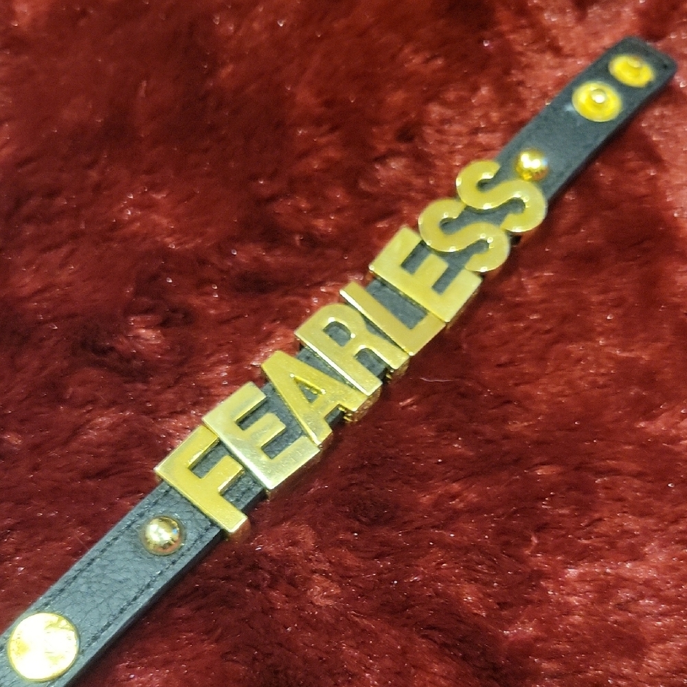 BCBGeneration Gold and Black Belt-like Bracelet with Bold Design